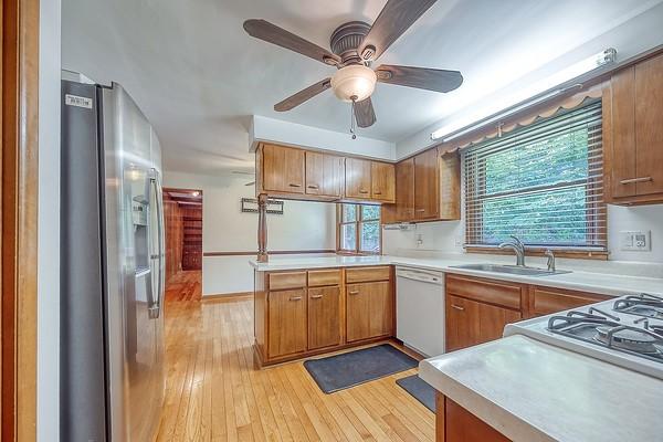 4517 W Brightview Ave, Whitehall, PA 15227 - kitchen with stainless steel refrigerator with ice dispenser, dishwasher, light countertops, and brown cabinets