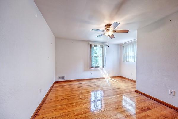 4517 W Brightview Ave, Whitehall, PA 15227 - unfurnished room featuring a ceiling fan and wood finished floors