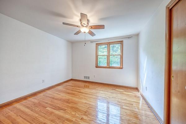 4517 W Brightview Ave, Whitehall, PA 15227 - empty room with light wood-style floors and ceiling fan