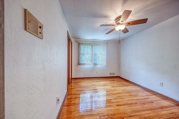 4517 W Brightview Ave, Whitehall, PA 15227 - empty room featuring wood finished floors and ceiling fan
