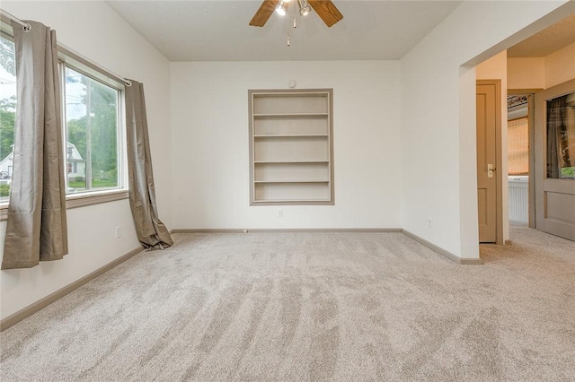 407 Hill St, Grove City Boro, PA 16127 - carpeted spare room featuring ceiling fan and built in shelves