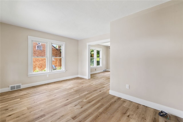 404 Ariston Ave, Carrick, PA 15210 - empty room with baseboards and wood finished floors