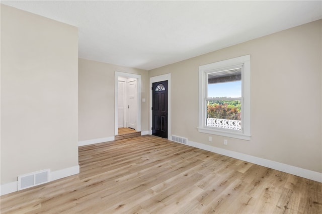 404 Ariston Ave, Carrick, PA 15210 - empty room featuring baseboards and wood finished floors