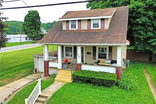 1107 W Ridge Ave, Sharpsville, PA 16150 - view of front of property with covered porch and a garage