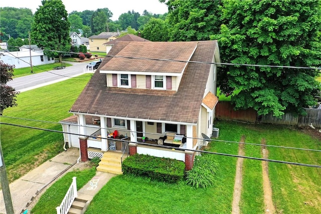 1107 W Ridge Ave, Sharpsville, PA 16150 - view of front of home with covered porch and a garage