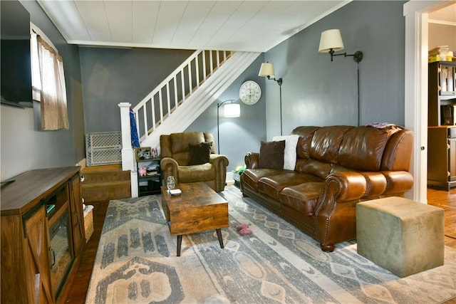 1107 W Ridge Ave, Sharpsville, PA 16150 - living area featuring stairway, wood finished floors, and ornamental molding