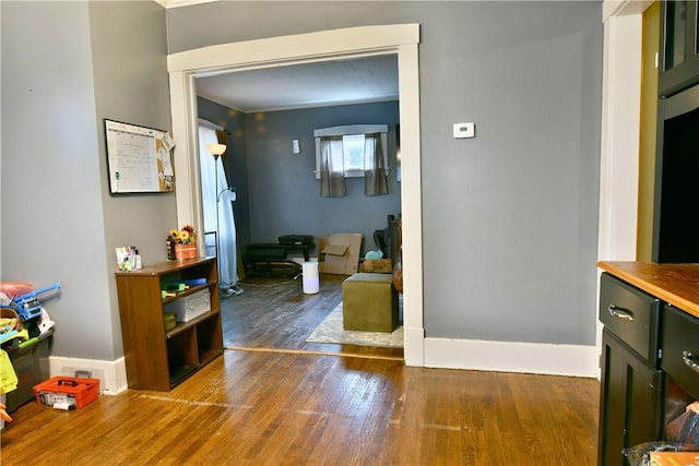 1107 W Ridge Ave, Sharpsville, PA 16150 - hallway with wood finished floors and baseboards