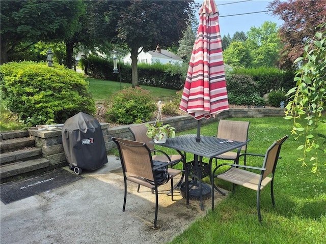 414 Sloan Ave, Jeannette, PA 15644 - view of patio with outdoor dining space and a grill