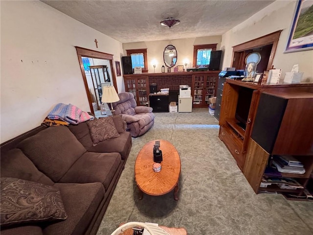 1506 Victoria Ave, New Kensington, PA 15068 - living area featuring carpet and a textured ceiling