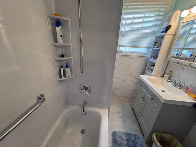 1506 Victoria Ave, New Kensington, PA 15068 - full bathroom with vanity, tile walls, shower / washtub combination, and tile patterned flooring