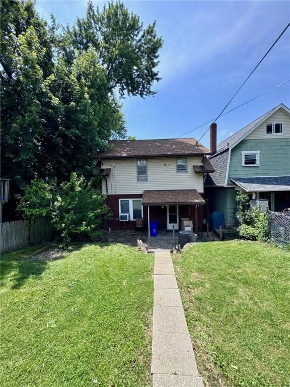1506 Victoria Ave, New Kensington, PA 15068 - rear view of house with a patio area