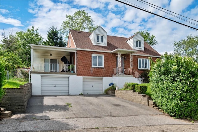615 School St, West Mifflin, PA 15122 - view of front of house with driveway, an attached garage, brick siding, and roof with shingles