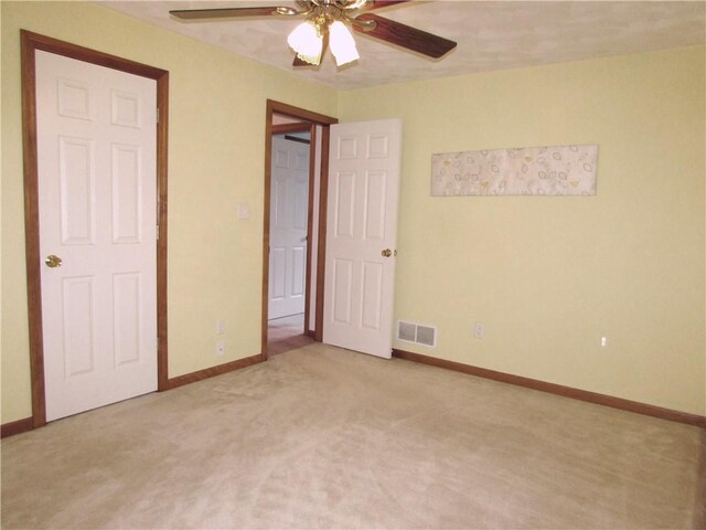 3853 Grist Mill Ln, Murrysville, PA 15668 - unfurnished bedroom featuring light colored carpet and ceiling fan