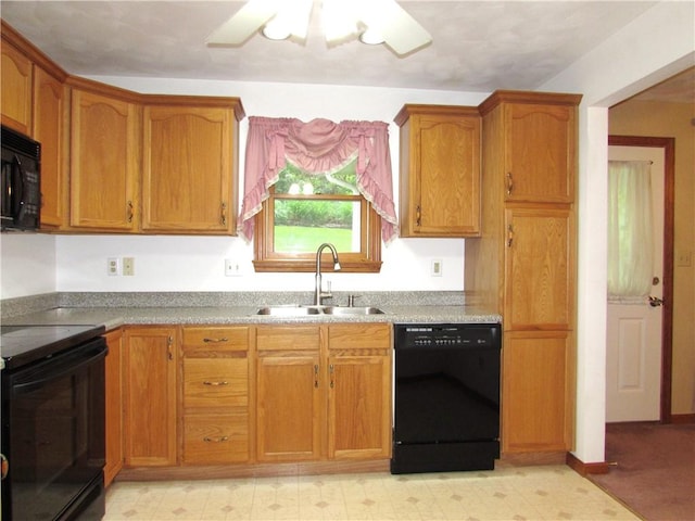 3853 Grist Mill Ln, Murrysville, PA 15668 - kitchen with black appliances, brown cabinets, light floors, and light countertops