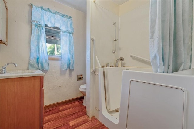 101 7th St, Monongahela City, PA 15063 - full bath with vanity, wood finished floors, and bathtub / shower combination