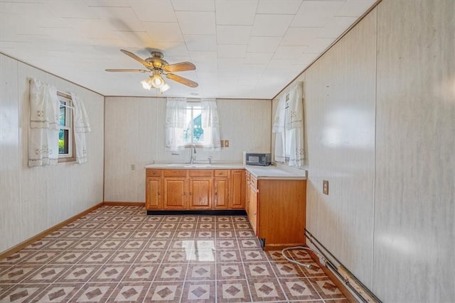 101 7th St, Monongahela City, PA 15063 - kitchen featuring black microwave, a ceiling fan, light countertops, and light floors