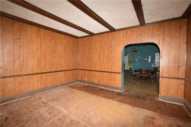 420 Tanner St, Sharon, PA 16146 - unfurnished room with beam ceiling, arched walkways, and wood walls
