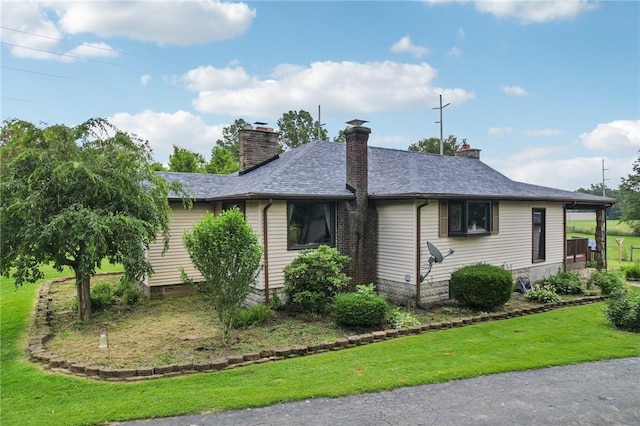 4296 Morefield Rd, Hermitage, PA 16148 - view of side of home featuring a lawn and a chimney