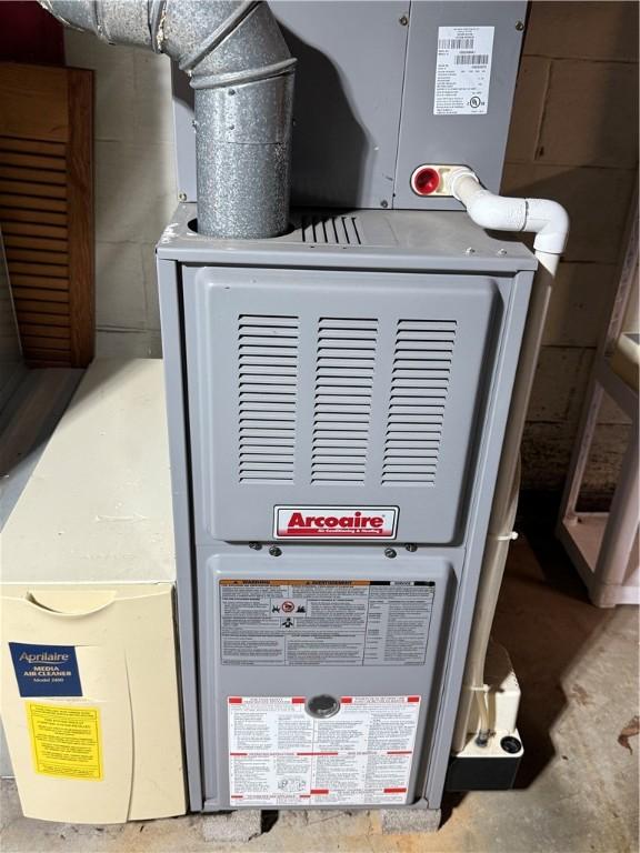 2801 7th Street Rd, Lower Burrell, PA 15068 - utility room featuring heating unit