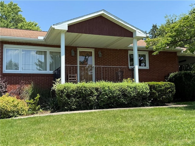 2801 7th Street Rd, Lower Burrell, PA 15068 - view of front facade with brick siding and a front yard