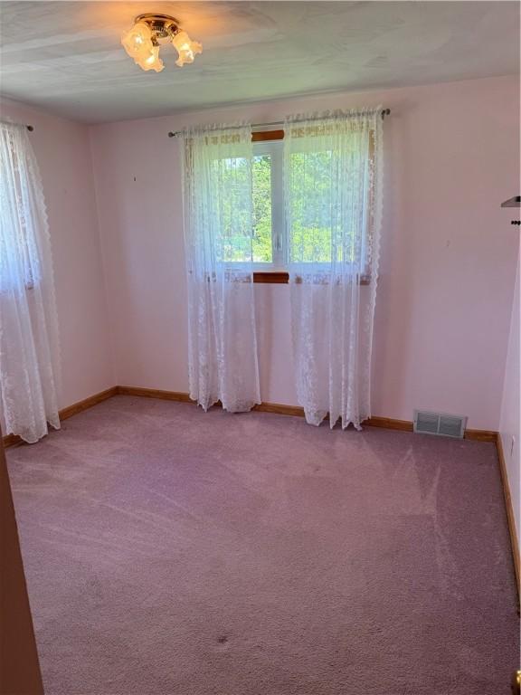 2801 7th Street Rd, Lower Burrell, PA 15068 - empty room featuring carpet floors and baseboards