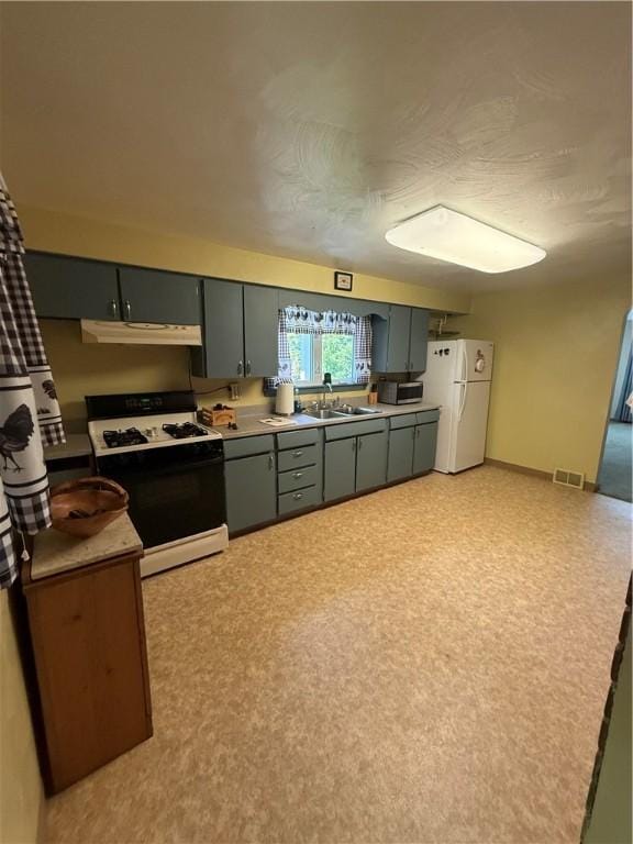 2801 7th Street Rd, Lower Burrell, PA 15068 - kitchen with white appliances, under cabinet range hood, gray cabinetry, and light countertops