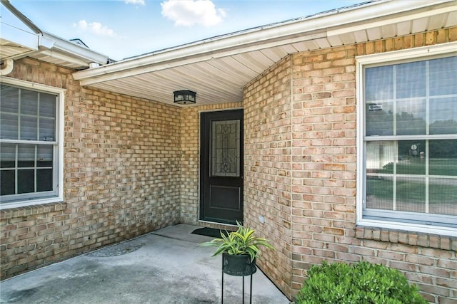 117 Clubhouse Cir, Shenango Twp Mer, PA 16159 - doorway to property featuring brick siding and covered porch