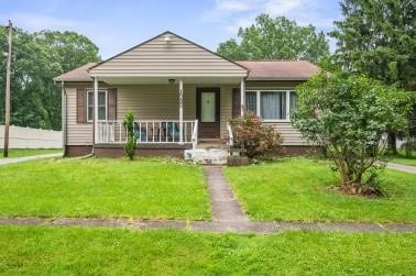 1090-94 N Darby Rd, Hermitage, PA 16148 - view of front facade featuring a front lawn and a porch