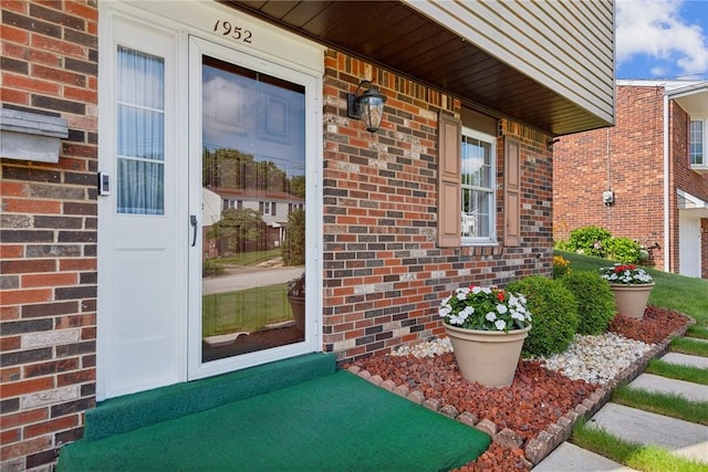 1952 Dearborn Dr, White Oak, PA 15131 - view of exterior entry featuring brick siding and a porch