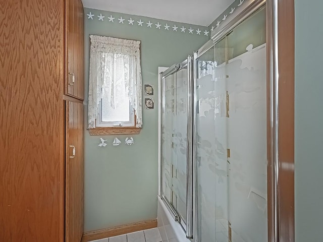 1138 Union Ave, Brackenridge, PA 15014 - bathroom featuring enclosed tub / shower combo and tile patterned floors