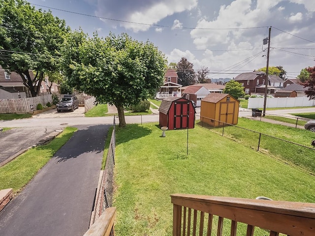 1138 Union Ave, Brackenridge, PA 15014 - view of yard featuring a storage unit and a residential view