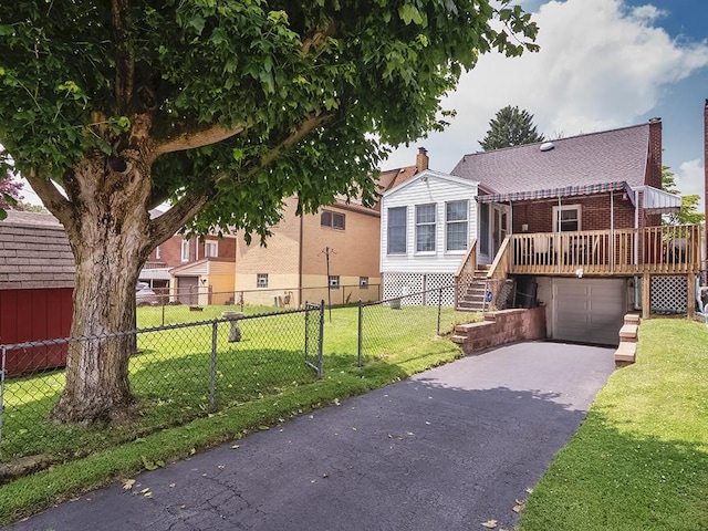 1138 Union Ave, Brackenridge, PA 15014 - view of front of house featuring asphalt driveway, a wooden deck, a garage, and stairs