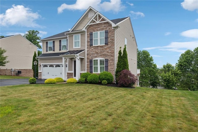 509 Saddle Ridge Dr, Penn Twp Wml, PA 15642 - craftsman-style home featuring stone siding, an attached garage, a front yard, and asphalt driveway
