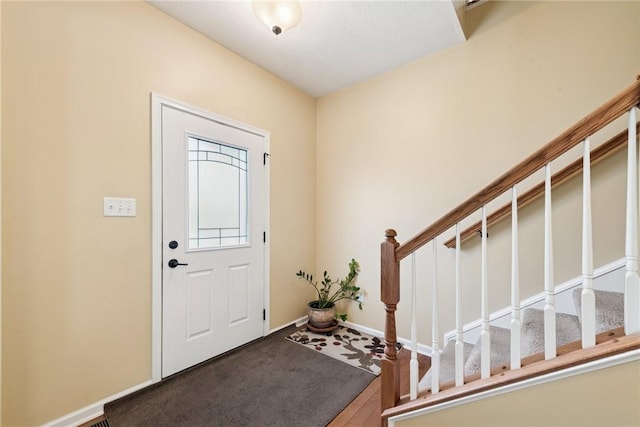 509 Saddle Ridge Dr, Penn Twp Wml, PA 15642 - entryway featuring stairs and wood finished floors