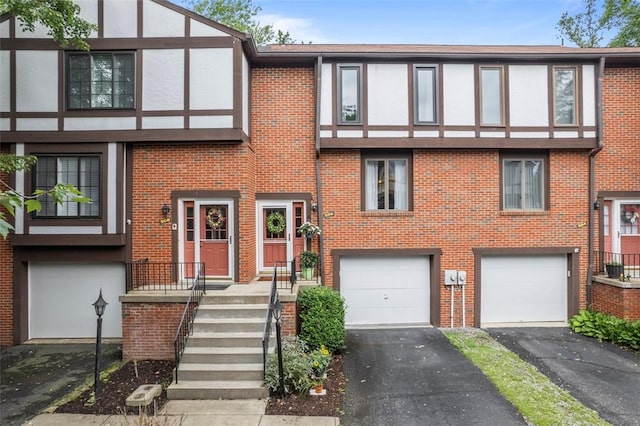 206 Little Hollow Dr, Aleppo, PA 15143 - view of front facade with a garage, driveway, and brick siding