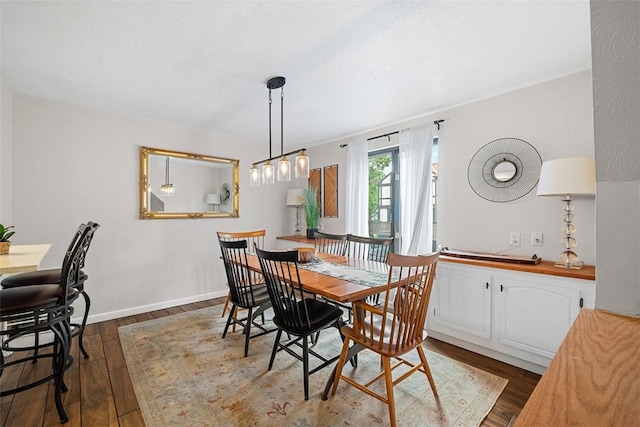 206 Little Hollow Dr, Aleppo, PA 15143 - dining room with dark wood-type flooring and baseboards