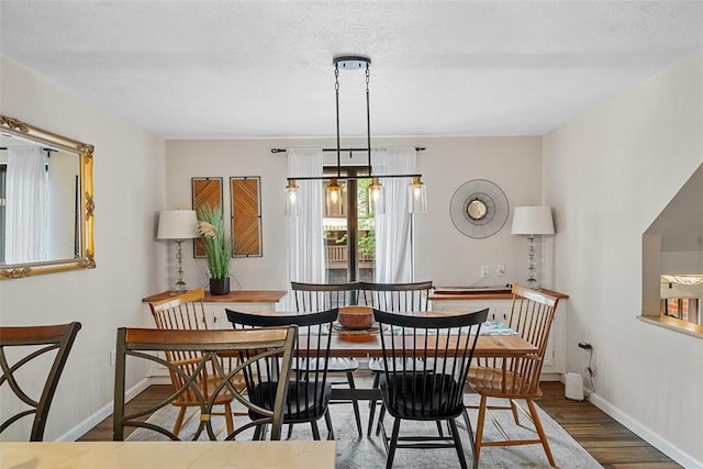 206 Little Hollow Dr, Aleppo, PA 15143 - dining room featuring wood finished floors and a textured ceiling