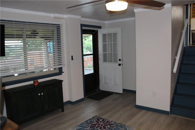 533 Charlotte Dr, Baldwin Boro, PA 15236 - entryway with ceiling fan, stairway, wood finished floors, and ornamental molding