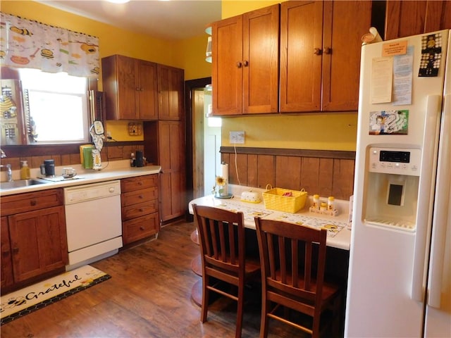 577 Woodside Old Frame Rd, Smithfield, PA 15478 - kitchen with white appliances, dark wood finished floors, brown cabinets, and light countertops