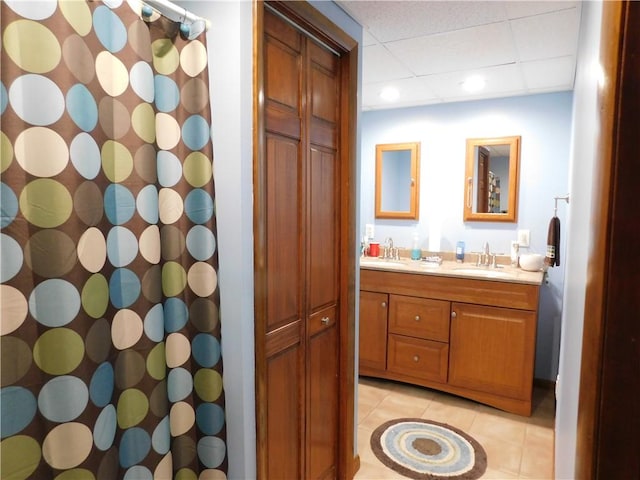 577 Woodside Old Frame Rd, Smithfield, PA 15478 - full bathroom with double vanity, tile patterned floors, a drop ceiling, a shower with shower curtain, and recessed lighting