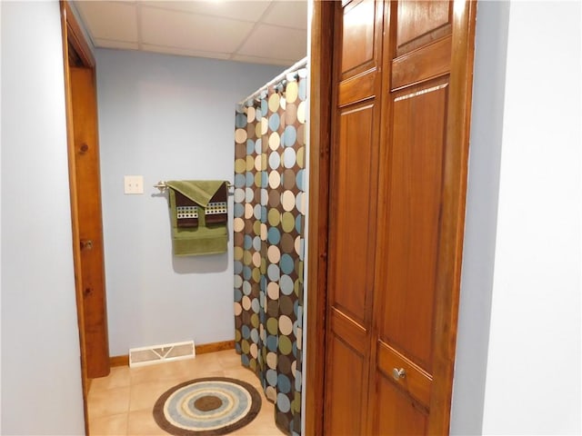 577 Woodside Old Frame Rd, Smithfield, PA 15478 - bathroom featuring a paneled ceiling, a shower with curtain, and tile patterned flooring