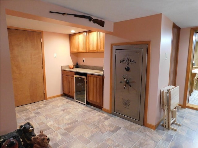 577 Woodside Old Frame Rd, Smithfield, PA 15478 - kitchen with wine cooler, light countertops, stone finish floors, and radiator heating unit