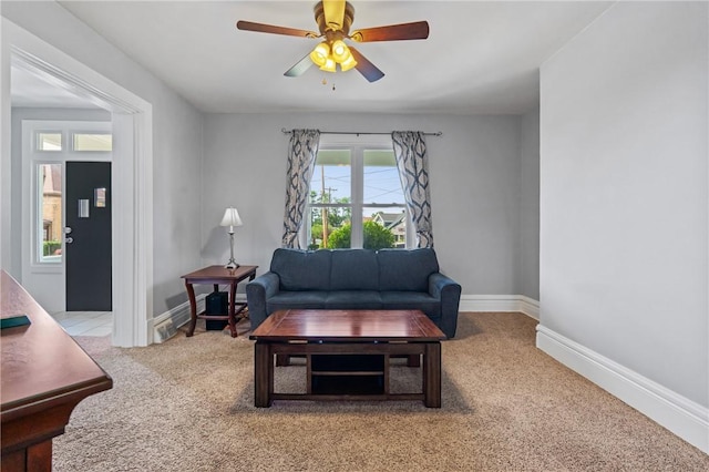 616 W College St, Canonsburg, PA 15317 - living area with carpet floors and ceiling fan