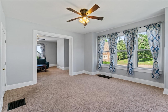616 W College St, Canonsburg, PA 15317 - carpeted spare room with ceiling fan and baseboards