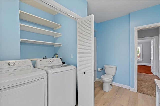 616 W College St, Canonsburg, PA 15317 - laundry room with washing machine and dryer and light wood-type flooring