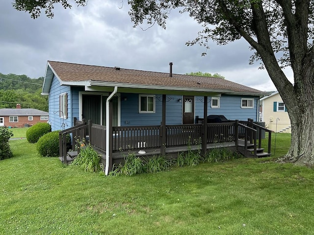170 Canal St, Center Twp/Homer Cty, PA 15748 - back of property featuring a deck, a lawn, and a shingled roof