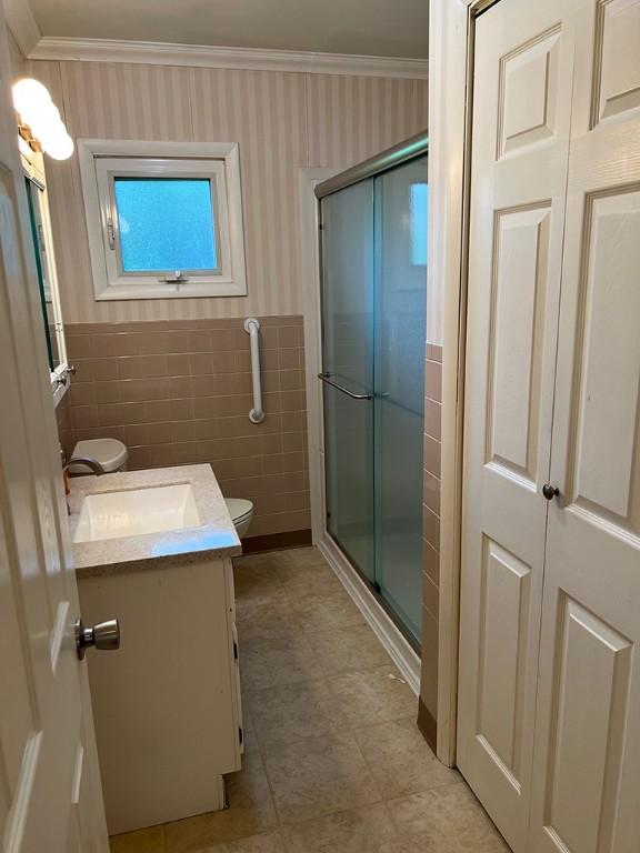 170 Canal St, Center Twp/Homer Cty, PA 15748 - bathroom featuring crown molding, vanity, wallpapered walls, a stall shower, and wainscoting