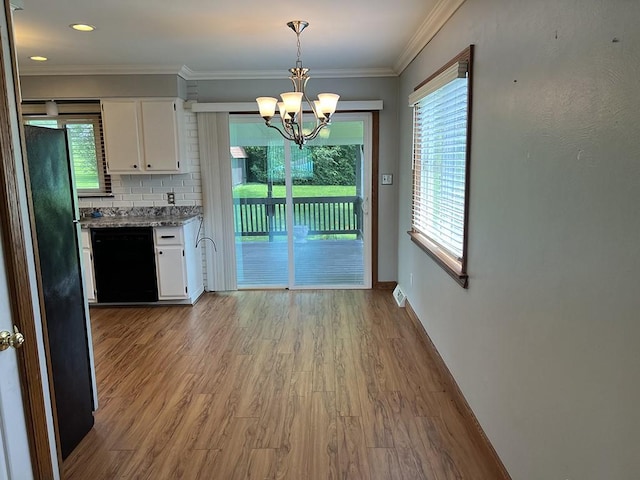 170 Canal St, Center Twp/Homer Cty, PA 15748 - unfurnished dining area featuring a chandelier, light wood-type flooring, plenty of natural light, and crown molding