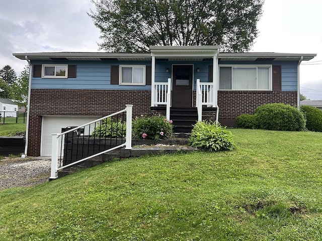 170 Canal St, Center Twp/Homer Cty, PA 15748 - view of front of house with brick siding, a garage, a front lawn, and driveway