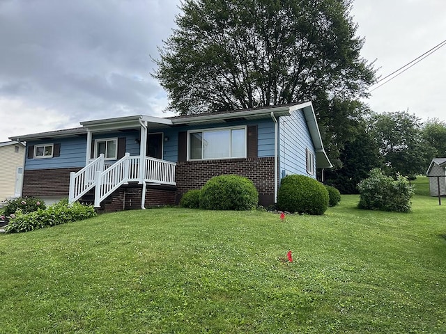 170 Canal St, Center Twp/Homer Cty, PA 15748 - ranch-style house with brick siding and a front yard